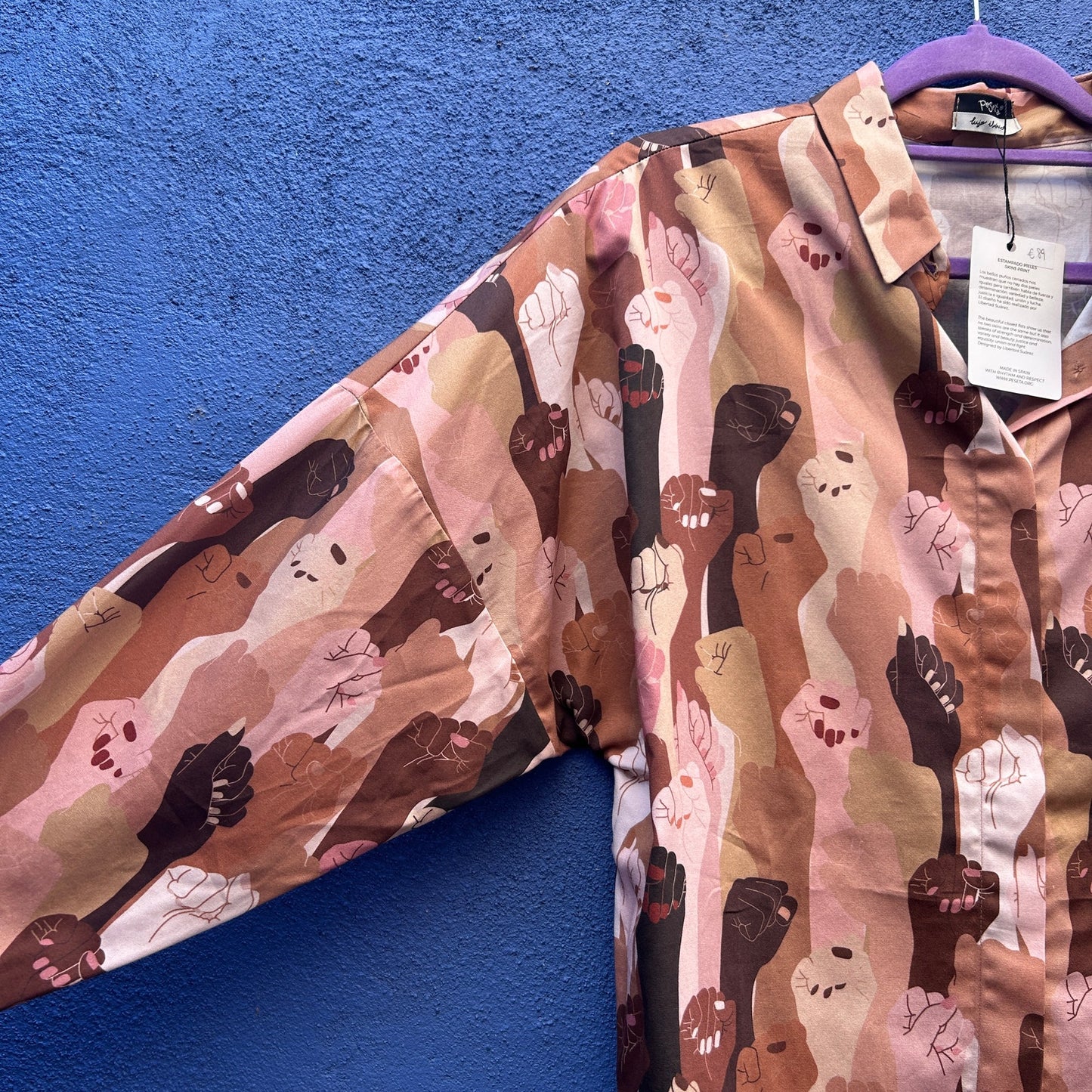 peseta skins print protest fist button up - NWT