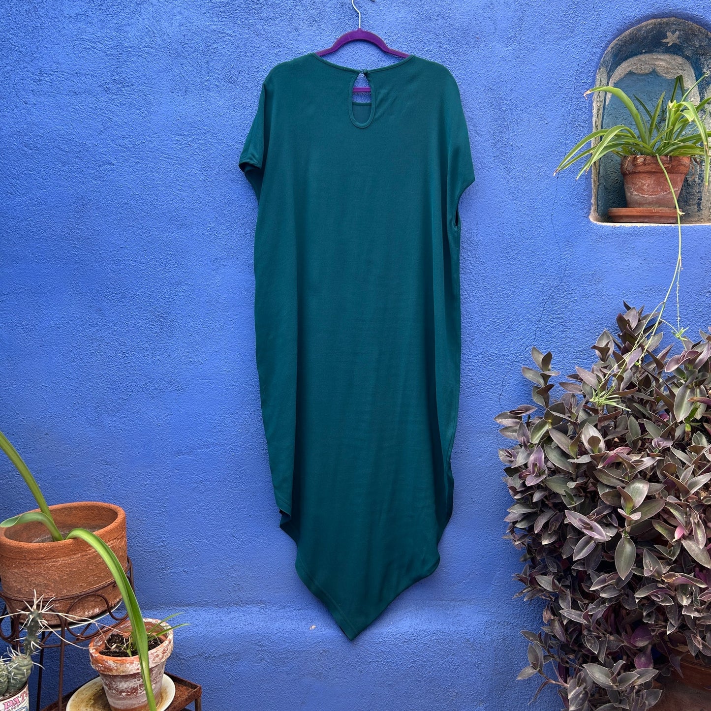 universal standard iconic geneva green asymmetrical hem maxi dress