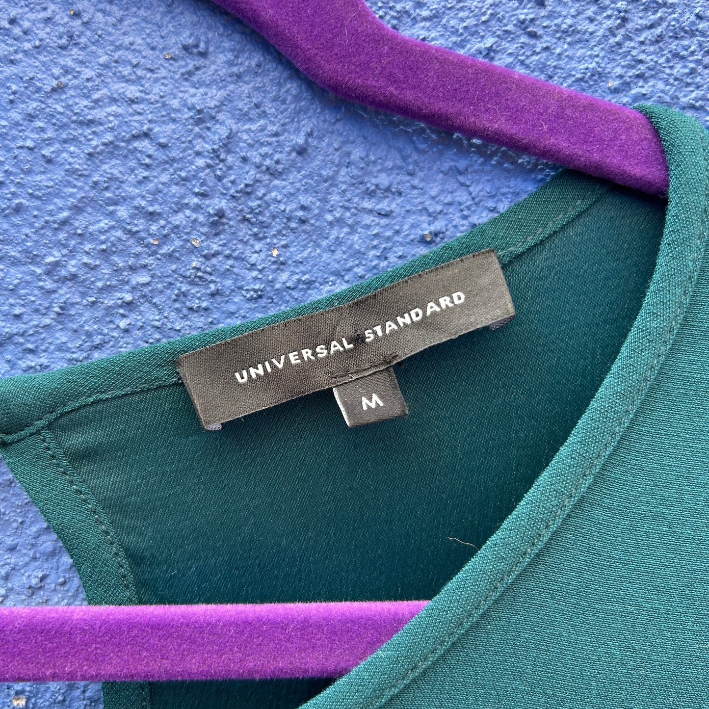 universal standard iconic geneva green asymmetrical hem maxi dress