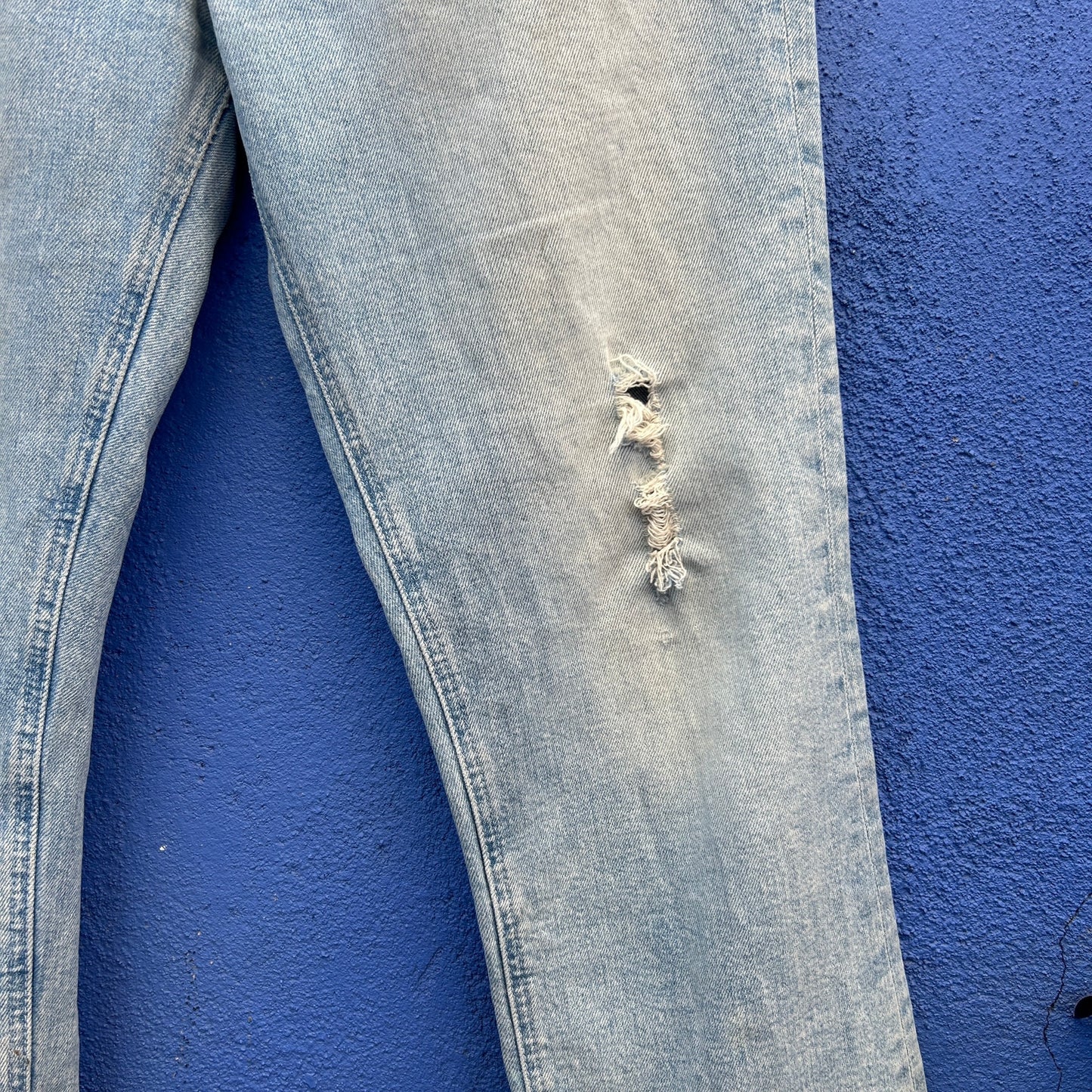 mother the tripper light washed distressed jeans