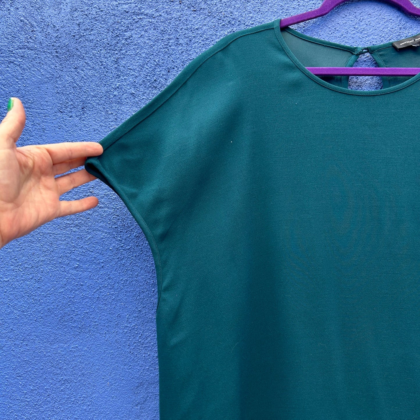 universal standard iconic geneva green asymmetrical hem maxi dress