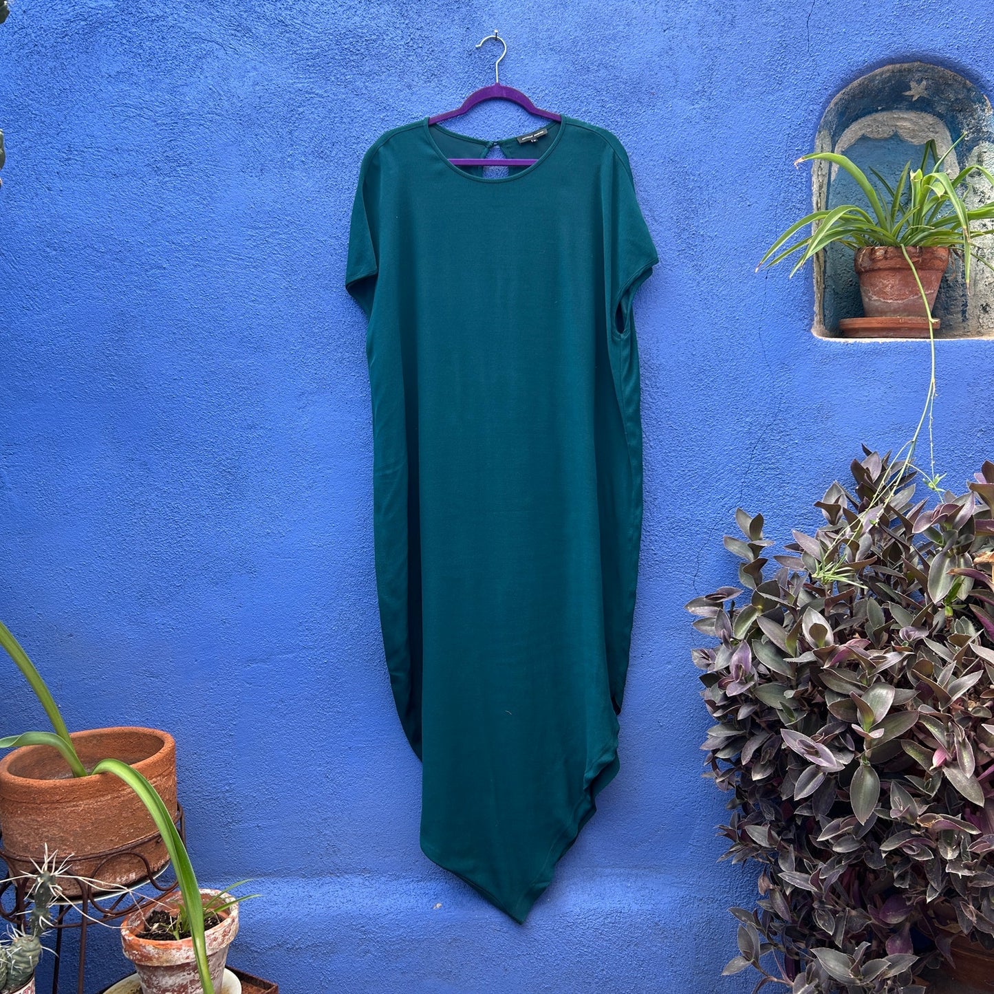 universal standard iconic geneva green asymmetrical hem maxi dress